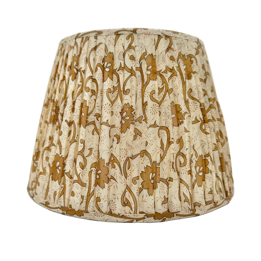 Decorative lampshade with brown floral pattern on a white background