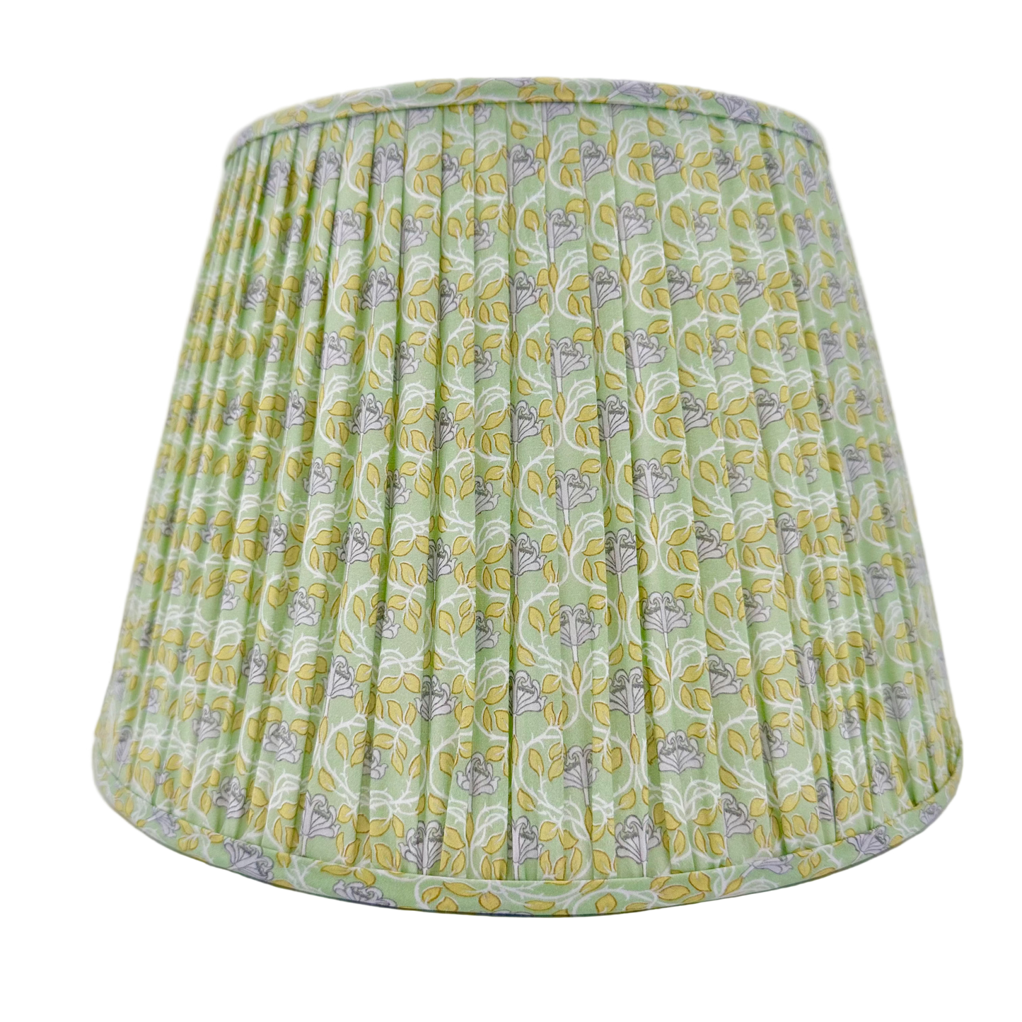 Green patterned lampshade on a white background